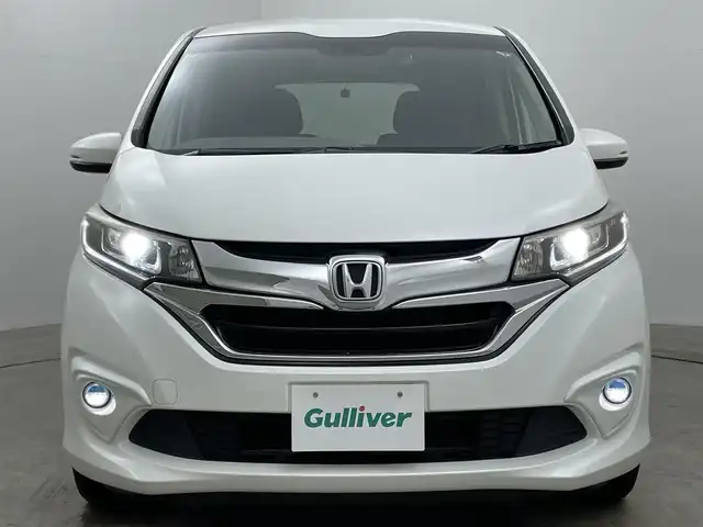 ホンダ フリード ハイブリット G 岡山県 2016(平28)年 14万km ホワイトオーキッドパール 純正ナビ/・FM/AM/Bluetooth/フルセグ/CD/DVD/バックカメラ/両側パワースライド/ETC/社外ドライブレコーダー（前後）/クルーズコントロール/スペアキー1本/盗難防止装置/横滑り防止装置/純正LEDヘッドライト/・オートライト/・フォグライト/純正フロアマット