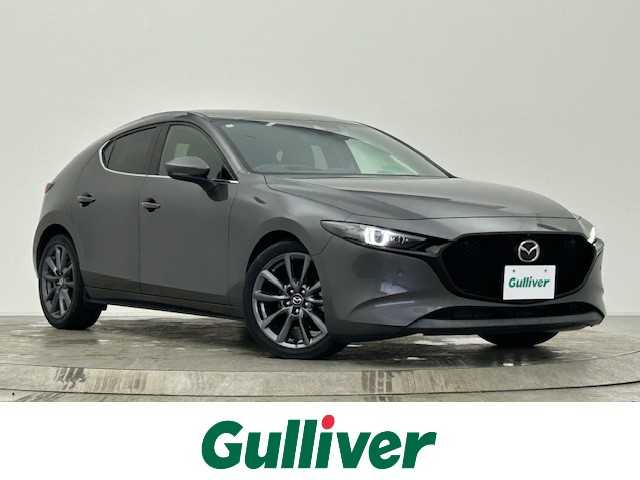 マツダ マツダ３ファストバック 20S Lパッケージ 宮城県 2020(令2)年 4.4万km マシーングレープレミアムM 純正ナビ/フルセグTV/AM/FM/Bluetooth/CD/DVD/全方位カメラ/レーダークルーズコントロール/運転席パワーシート/前席シートヒーター/ステアリングヒーター/パドルシフト/ブラインドスポットモニター/純正18インチAW/クリアランスソナー/横滑り防止装置/衝突被害軽減システム/前後ドライブレコーダー/スペアキー×1/オートライト/オートマチックハイビーム/ETC/取扱説明書/純正フロアマット