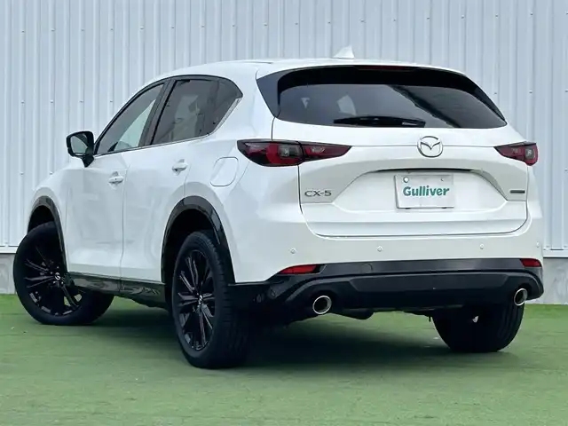 マツダ ＣＸ－５ 25S スポーツアピアランス 香川県 2021(令3)年 1.5万km スノーフレイクホワイトパールマイカ 登録時走行距離14768km/1オーナー/純正10.25型ディスプレイオーディオ/（フルセグTV/Bluetooth/USB）/純正前後ドライブレコーダー/i-ACTIVSENSE/・360°ビューモニター/・アドバンストスマートシティブレーキサポート/・レーダークルーズコントロール/・レーンキープアシスト/・車線逸脱警報システム/・ブラインドスポットモニター/・交通標識認識/・ドライバーアテンションアラート/・アダプティブフロントライティングシステム/・ハイビームコントロールシステム/LEDヘッドライト/ヘッドアップディスプレイ/電動パーキングブレーキ/オートブレーキホールド/オートワイパー/革巻きステアリング/ステアリングスイッチ/パドルシフト/ステアリングヒーター/黒革シート/前席パワーシート/前席シートヒーター/電動バックドア/ワイヤレス充電器/純正ETC/純正19インチ専用アルミホイール/純正フロアマット/トノカバー/ISOFIX/スペアキー/新車保証書/整備記録簿/取扱説明書