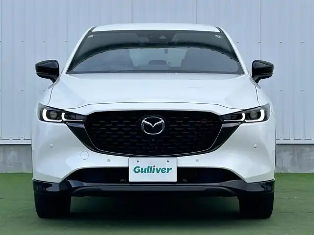 マツダ ＣＸ－５ 25S スポーツアピアランス 香川県 2021(令3)年 1.5万km スノーフレイクホワイトパールマイカ 登録時走行距離14768km/1オーナー/純正10.25型ディスプレイオーディオ/（フルセグTV/Bluetooth/USB）/純正前後ドライブレコーダー/i-ACTIVSENSE/・360°ビューモニター/・アドバンストスマートシティブレーキサポート/・レーダークルーズコントロール/・レーンキープアシスト/・車線逸脱警報システム/・ブラインドスポットモニター/・交通標識認識/・ドライバーアテンションアラート/・アダプティブフロントライティングシステム/・ハイビームコントロールシステム/LEDヘッドライト/ヘッドアップディスプレイ/電動パーキングブレーキ/オートブレーキホールド/オートワイパー/革巻きステアリング/ステアリングスイッチ/パドルシフト/ステアリングヒーター/黒革シート/前席パワーシート/前席シートヒーター/電動バックドア/ワイヤレス充電器/純正ETC/純正19インチ専用アルミホイール/純正フロアマット/トノカバー/ISOFIX/スペアキー/新車保証書/整備記録簿/取扱説明書