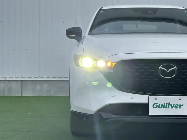 マツダ ＣＸ－５ 25S スポーツアピアランス 香川県 2021(令3)年 1.5万km スノーフレイクホワイトパールマイカ 登録時走行距離14768km/1オーナー/純正10.25型ディスプレイオーディオ/（フルセグTV/Bluetooth/USB）/純正前後ドライブレコーダー/i-ACTIVSENSE/・360°ビューモニター/・アドバンストスマートシティブレーキサポート/・レーダークルーズコントロール/・レーンキープアシスト/・車線逸脱警報システム/・ブラインドスポットモニター/・交通標識認識/・ドライバーアテンションアラート/・アダプティブフロントライティングシステム/・ハイビームコントロールシステム/LEDヘッドライト/ヘッドアップディスプレイ/電動パーキングブレーキ/オートブレーキホールド/オートワイパー/革巻きステアリング/ステアリングスイッチ/パドルシフト/ステアリングヒーター/黒革シート/前席パワーシート/前席シートヒーター/電動バックドア/ワイヤレス充電器/純正ETC/純正19インチ専用アルミホイール/純正フロアマット/トノカバー/ISOFIX/スペアキー/新車保証書/整備記録簿/取扱説明書