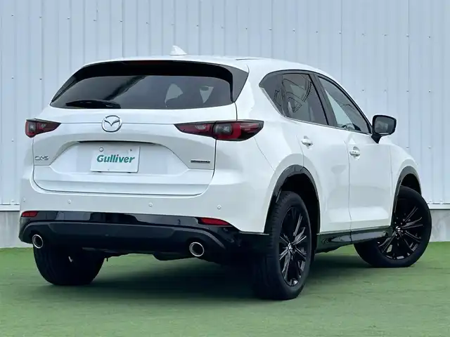 マツダ ＣＸ－５ 25S スポーツアピアランス 香川県 2021(令3)年 1.5万km スノーフレイクホワイトパールマイカ 登録時走行距離14768km/1オーナー/純正10.25型ディスプレイオーディオ/（フルセグTV/Bluetooth/USB）/純正前後ドライブレコーダー/i-ACTIVSENSE/・360°ビューモニター/・アドバンストスマートシティブレーキサポート/・レーダークルーズコントロール/・レーンキープアシスト/・車線逸脱警報システム/・ブラインドスポットモニター/・交通標識認識/・ドライバーアテンションアラート/・アダプティブフロントライティングシステム/・ハイビームコントロールシステム/LEDヘッドライト/ヘッドアップディスプレイ/電動パーキングブレーキ/オートブレーキホールド/オートワイパー/革巻きステアリング/ステアリングスイッチ/パドルシフト/ステアリングヒーター/黒革シート/前席パワーシート/前席シートヒーター/電動バックドア/ワイヤレス充電器/純正ETC/純正19インチ専用アルミホイール/純正フロアマット/トノカバー/ISOFIX/スペアキー/新車保証書/整備記録簿/取扱説明書