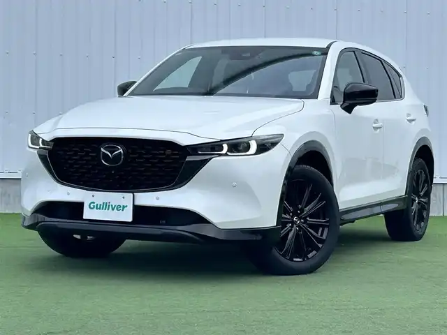 マツダ ＣＸ－５ 25S スポーツアピアランス 香川県 2021(令3)年 1.5万km スノーフレイクホワイトパールマイカ 登録時走行距離14768km/1オーナー/純正10.25型ディスプレイオーディオ/（フルセグTV/Bluetooth/USB）/純正前後ドライブレコーダー/i-ACTIVSENSE/・360°ビューモニター/・アドバンストスマートシティブレーキサポート/・レーダークルーズコントロール/・レーンキープアシスト/・車線逸脱警報システム/・ブラインドスポットモニター/・交通標識認識/・ドライバーアテンションアラート/・アダプティブフロントライティングシステム/・ハイビームコントロールシステム/LEDヘッドライト/ヘッドアップディスプレイ/電動パーキングブレーキ/オートブレーキホールド/オートワイパー/革巻きステアリング/ステアリングスイッチ/パドルシフト/ステアリングヒーター/黒革シート/前席パワーシート/前席シートヒーター/電動バックドア/ワイヤレス充電器/純正ETC/純正19インチ専用アルミホイール/純正フロアマット/トノカバー/ISOFIX/スペアキー/新車保証書/整備記録簿/取扱説明書