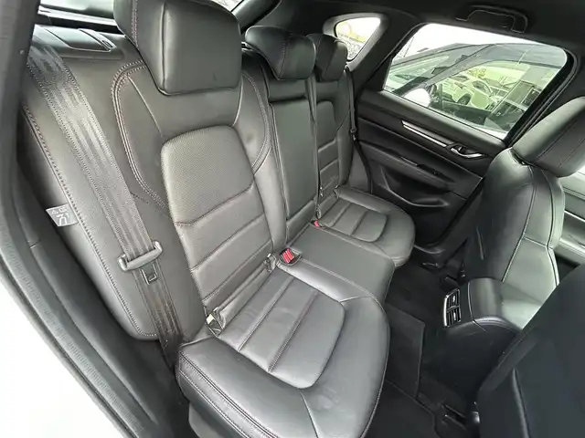 マツダ ＣＸ－５ 25S スポーツアピアランス 香川県 2021(令3)年 1.5万km スノーフレイクホワイトパールマイカ 登録時走行距離14768km/1オーナー/純正10.25型ディスプレイオーディオ/（フルセグTV/Bluetooth/USB）/純正前後ドライブレコーダー/i-ACTIVSENSE/・360°ビューモニター/・アドバンストスマートシティブレーキサポート/・レーダークルーズコントロール/・レーンキープアシスト/・車線逸脱警報システム/・ブラインドスポットモニター/・交通標識認識/・ドライバーアテンションアラート/・アダプティブフロントライティングシステム/・ハイビームコントロールシステム/LEDヘッドライト/ヘッドアップディスプレイ/電動パーキングブレーキ/オートブレーキホールド/オートワイパー/革巻きステアリング/ステアリングスイッチ/パドルシフト/ステアリングヒーター/黒革シート/前席パワーシート/前席シートヒーター/電動バックドア/ワイヤレス充電器/純正ETC/純正19インチ専用アルミホイール/純正フロアマット/トノカバー/ISOFIX/スペアキー/新車保証書/整備記録簿/取扱説明書