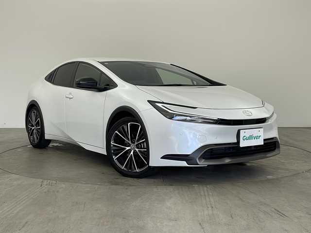 トヨタ プリウス G 兵庫県 2024(令6)年 3.1万km プラチナホワイトパールマイカ ・純正８インチディスプレイオーディオナビ/・BT/USB/Miracast/フルセグTV/・バックカメラ/・トヨタセーフティセンス/・レーンディパーチャーアラート/・ブラインドスポットモニター/・プリクラッシュセーフティ/・プロアクティブドライビングアシスト/・クリアランスソナー/・リアクロストラフィックアラート/・後方車両接近告知/・リアカメラディテクション/・パーキングサポートブレーキ/・安心降車アシスト/・周辺車両接近時サポート/・ロードサインアシスト/・レーダークルーズコントロール/・発進遅れ告知/・ETC/・シートヒーター/・オートマチックハイビーム/・LEDオートライト/・AC100V/・純正１９インチアルミホイール/・純正フロアマット/・ステアリングリモコン/・ヘッドライトレベライザー/・ブレーキホールド/・電動パーキングブレーキ/・スマートキー/・プッシュスタート/・W＋サイドエアバッグ/・カーテンエアバッグ