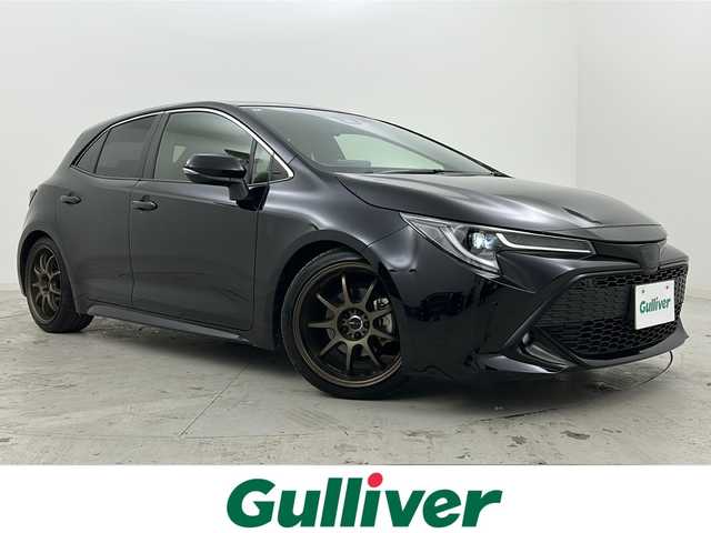 トヨタ カローラ スポーツ ハイブリッドG 宮城県 2022(令4)年 6.8万km アティチュードブラックマイカ 禁煙車/ワンオーナー/トヨタセーフティセンス/・プリクラッシュセーフティ/・レーントレーシングアシスト/・オートマチックハイビーム/・レーダークルーズコントロール/・ロードサインアシスト/・パーキングサポートブレーキ/ブラインドスポットモニター/リヤクロストラフィックアラート/純正9インチディスプレイオーディオ/・BT/AM/FM/USB/Mira/バックカメラ/純正ドライブレコーダー/ビルトインETC/電動パーキングブレーキ/オートホールド/革巻きステアリング/ステアリングスイッチ/プッシュスタート/スマートキー/ハーフレザーシート/LEDヘッドライト/LEDフォグランプ/純正フロアマット/社外18インチアルミホイール/横滑り防止装置/アイドリングストップ/ヘッドライトレベライザー/デュアルエアコン