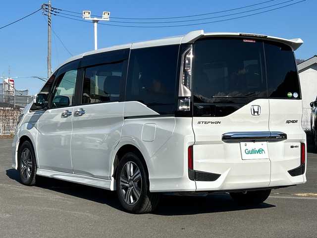 ホンダ ステップワゴン スパーダ eHEV G EXホンダS 山梨県 2021(令3)年 6.9万km プラチナホワイトパール 純正ＳＤナビ　/フルセグＴＶ　/全方位カメラ　/純正ビルトインＥＴＣ２．０　/Ｂｌｕｅｔｏｏｔｈ／ＵＳＢ／ＣＤ　/３列シート　/ハーフレザーシート　/運転席／助手席シートヒーター　/両側パワースライドドア　/ＡＢＳ