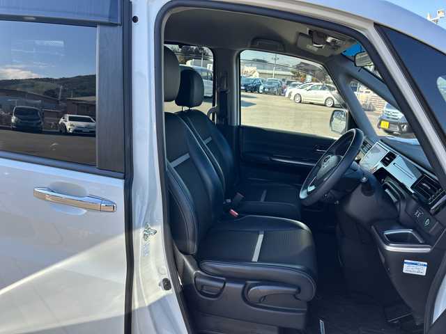 ホンダ ステップワゴン スパーダ eHEV G EXホンダS 山梨県 2021(令3)年 6.9万km プラチナホワイトパール 純正ＳＤナビ　/フルセグＴＶ　/全方位カメラ　/純正ビルトインＥＴＣ２．０　/Ｂｌｕｅｔｏｏｔｈ／ＵＳＢ／ＣＤ　/３列シート　/ハーフレザーシート　/運転席／助手席シートヒーター　/両側パワースライドドア　/ＡＢＳ