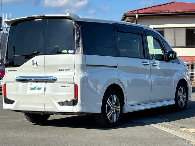 ホンダ ステップワゴン スパーダ eHEV G EXホンダS 山梨県 2021(令3)年 6.9万km プラチナホワイトパール 純正ＳＤナビ　/フルセグＴＶ　/全方位カメラ　/純正ビルトインＥＴＣ２．０　/Ｂｌｕｅｔｏｏｔｈ／ＵＳＢ／ＣＤ　/３列シート　/ハーフレザーシート　/運転席／助手席シートヒーター　/両側パワースライドドア　/ＡＢＳ