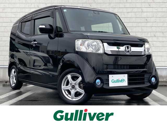 ホンダ Ｎ ＢＯＸ スラッシュ X ターボパッケージ 静岡県 2015(平27)年 8.2万km スマートブラック あんしんパッケージ/純正7インチナビ(VRM-155VFi)/　AM FM CD DVD Bluetooth MusicRack/前後方ドライブレコーダー/クルーズコントロール/シートヒーター(前席)/ステアリングヒーター/HIDオートヘッドランプ/サウンドマッピングシステム/ワイヤレス充電/パドルシフト/スマートキー2本/ターボ/社外14インチアルミホイール/ETC/バックモニター/フルセグTV