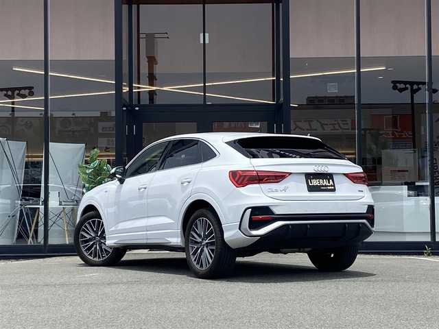 アウディ Ｑ３ SB 35TDIクワトロ Sライン 福岡県 2020(令2)年 2.3万km グレイシアホワイトメタリック ・アダプティブクルーズコントロール/・純正メモリーナビ/USB/Bluetooth/AppleCarPlay/・全方位カメラ/・ハーフレザーシート/シートヒーター/・社外前後ドライブレコーダー/・フルセグ/・ETC/・純正19AW/・プッシュスタート/・パーキングアシスト/・アイドリングストップ/・スマートキー/・スペアキー/・パワーシート/・レーンキープアシスト/・オートライト/・ＬＥＤライト/・保証書/・取扱説明書