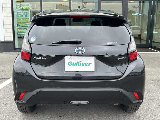 トヨタ アクア G 愛媛県 2024(令6)年 0.3万km ブラックマイカ 純正ディスプレイオーディオ（Bluetooth）/CD/DVDデッキ/ETC/レーダークルーズコントロール/バックカメラ/USB入力端子/スペアキー/前後ドライブレコーダー/前後コーナーセンサー/LEDヘッドライト/純正フロアマット/ABS/横滑り防止装置/レーンキープアシスト/盗難防止装置/オートマチックハイビーム/Wエアバッグ/衝突被害軽減システム