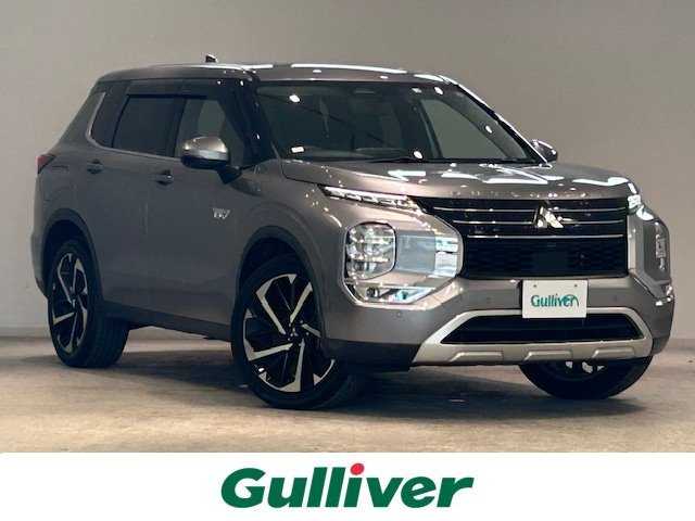 三菱 アウトランダー ＰＨＥＶ G 宮城県 2022(令4)年 2万km チタニウムグレーメタリック 4WD/e-Assist/・車線維持支援機能/・衝突被害軽減ブレーキシステム/・後退時交差車両検知警報システム/・ふらつき警告/・標識認識システム/純正メモリナビ/全方位カメラ/バックカメラ/フルセグテレビ/Bluetooth/クルーズコントロール/パドルシフト/純正ドラレコ前後/パワーシート/シートヒーター/純正LEDヘッドライト/オートライト/オートマチックハイビーム/フォグランプ/横滑り防止装置/アンチロックブレーキシステム/純正アルミホイール/純正フロアマット