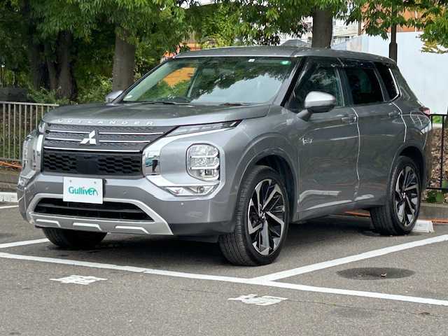 三菱 アウトランダー ＰＨＥＶ G 宮城県 2022(令4)年 2万km チタニウムグレーメタリック 4WD/e-Assist/・車線維持支援機能/・衝突被害軽減ブレーキシステム/・後退時交差車両検知警報システム/・ふらつき警告/・標識認識システム/純正メモリナビ/全方位カメラ/バックカメラ/フルセグテレビ/Bluetooth/クルーズコントロール/パドルシフト/純正ドラレコ前後/パワーシート/シートヒーター/純正LEDヘッドライト/オートライト/オートマチックハイビーム/フォグランプ/横滑り防止装置/アンチロックブレーキシステム/純正アルミホイール/純正フロアマット