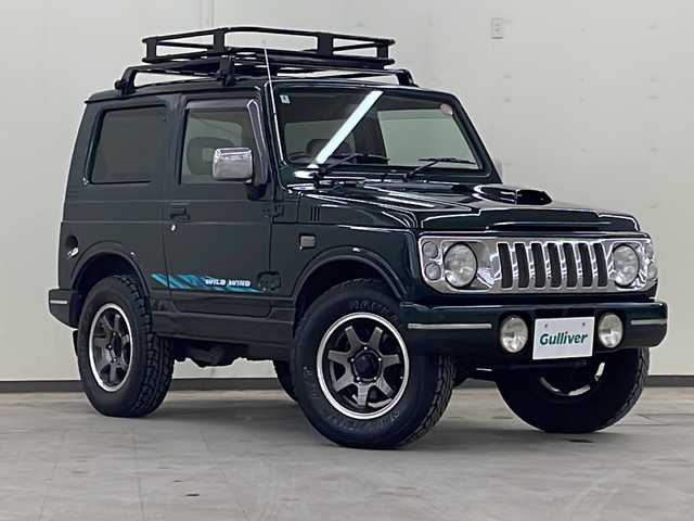 スズキ ジムニー ワイルドウィンド 道央・札幌 1997(平9)年 13.9万km ブリティッシュグリーンパール ４WD/ドアバイザー/純正アルミホイール