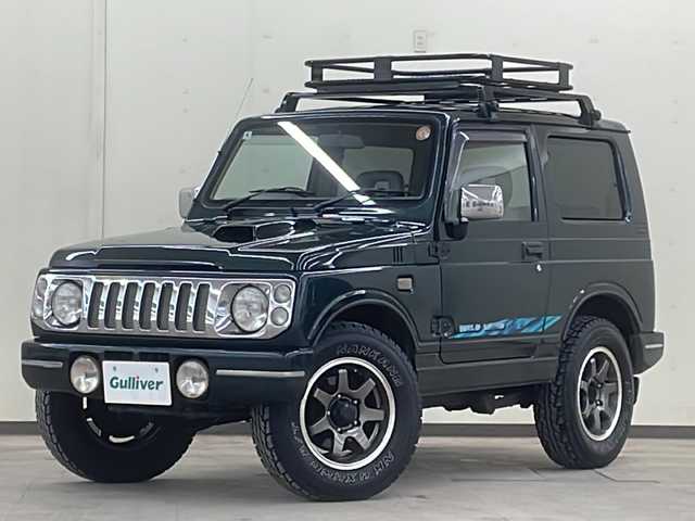 スズキ ジムニー ワイルドウィンド 道央・札幌 1997(平9)年 13.9万km ブリティッシュグリーンパール ４WD/ドアバイザー/純正アルミホイール