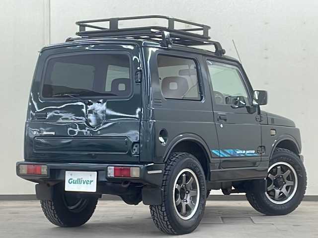 スズキ ジムニー ワイルドウィンド 道央・札幌 1997(平9)年 13.9万km ブリティッシュグリーンパール ４WD/ドアバイザー/純正アルミホイール