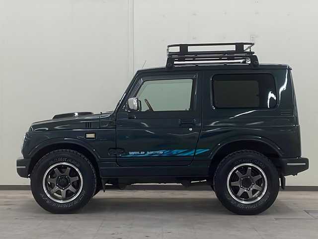 スズキ ジムニー ワイルドウィンド 道央・札幌 1997(平9)年 13.9万km ブリティッシュグリーンパール ４WD/ドアバイザー/純正アルミホイール