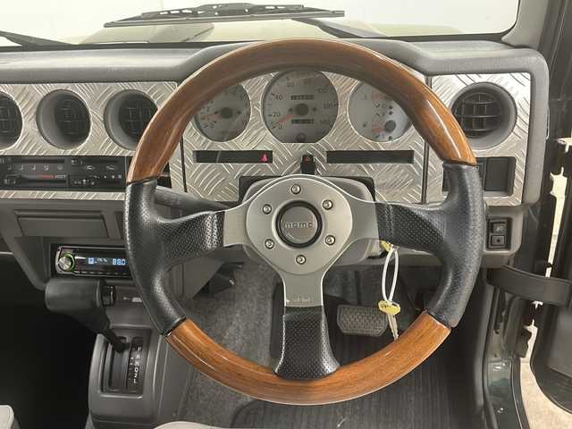 スズキ ジムニー ワイルドウィンド 道央・札幌 1997(平9)年 13.9万km ブリティッシュグリーンパール ４WD/ドアバイザー/純正アルミホイール