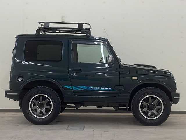 スズキ ジムニー ワイルドウィンド 道央・札幌 1997(平9)年 13.9万km ブリティッシュグリーンパール ４WD/ドアバイザー/純正アルミホイール