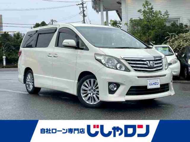 トヨタ アルファード 240S 愛知県 2013(平25)年 12万km ゴールドパールクリスタルシャイン (株)IDOMが運営する【じしゃロン名古屋鳴海店】の自社ローン専用車両になりますこちらは現金またはオートローンご利用時の価格です。自社ローンご希望の方は別途その旨お申付け下さい/社外ナビ/・型番：VIE-X009/・フルセグTV/SD/DVD/CD/BT/・バックカメラ/・ETC/・社外フリップダウン/革張ステアリング/・ステアリング/両側パワースライドドア/プッシュスタート/・スマートキー/電動格納ミラー/・ウィンカーミラー/キセノンヘッドライト/・フォグランプ/・オートライト/ドアバイザー/純正フロアマット