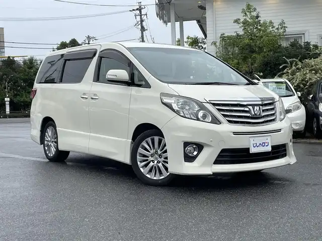 トヨタ アルファード 240S 愛知県 2013(平25)年 12万km ゴールドパールクリスタルシャイン (株)IDOMが運営する【じしゃロン名古屋鳴海店】の自社ローン専用車両になりますこちらは現金またはオートローンご利用時の価格です。自社ローンご希望の方は別途その旨お申付け下さい/社外ナビ/・型番：VIE-X009/・フルセグTV/SD/DVD/CD/BT/・バックカメラ/・ETC/・社外フリップダウン/革張ステアリング/・ステアリング/両側パワースライドドア/プッシュスタート/・スマートキー/電動格納ミラー/・ウィンカーミラー/キセノンヘッドライト/・フォグランプ/・オートライト/ドアバイザー/純正フロアマット