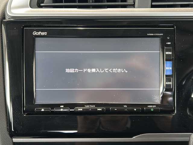 ホンダ フィット 15XL 富山県 2016(平28)年 0.3万km ティンテッドシルバーM 禁煙車/４ＷＤ/純正ＳＤナビ(地図SD無し)/ワンセグＴＶ/バックカメラ/クルーズコントロール/衝突軽減ブレーキ/アイドリングストップ/ＵＳＢ入力端子/純正フロアマット/純正アルミホイール/シートヒーター/ＥＴＣ/保証書