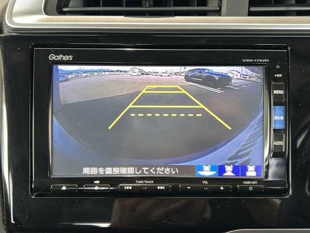 ホンダ フィット 15XL 富山県 2016(平28)年 0.3万km ティンテッドシルバーM 禁煙車/４ＷＤ/純正ＳＤナビ(地図SD無し)/ワンセグＴＶ/バックカメラ/クルーズコントロール/衝突軽減ブレーキ/アイドリングストップ/ＵＳＢ入力端子/純正フロアマット/純正アルミホイール/シートヒーター/ＥＴＣ/保証書