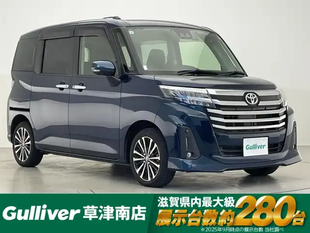 トヨタ ルーミー カスタムG－T 滋賀県 2021(令3)年 3.2万km レーザーブルークリスタルシャイン 純正8型ナビ/Bluetooth/SD/CD/フルセグTV/フロント/サイド/バック/全方位カメラ/純正12インチフリップダウンモニター/追従クルーズコントロール/両側パワースライドドア/シートヒーター/オートハイビーム/ステアリングリモコン/前後ドライブレコーダー/ETC