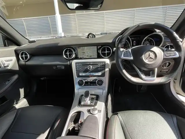 メルセデス・ベンツ ＳＬＣ１８０ スポーツ 大阪府 2017(平29)年 4.1万km ポーラホワイト 電動オープン/純正ナビ/フルセグテレビ/バックカメラ/ブラインドスポットモニター/スポーツサスペンション/アイドリングストップ/追従式クルーズコントロール/ビルトインETC/アダプティブLEDヘッドライト/ウィンカーミラー/アナログ時計/9速ATミッション