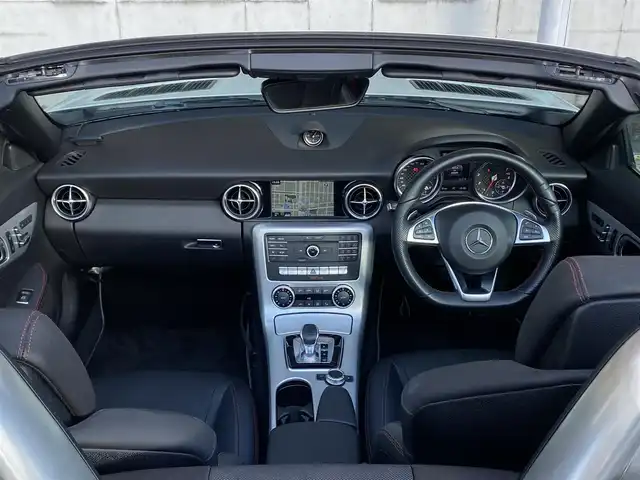 メルセデス・ベンツ ＳＬＣ１８０ スポーツ 大阪府 2017(平29)年 4.1万km ポーラホワイト 電動オープン/純正ナビ/フルセグテレビ/バックカメラ/ブラインドスポットモニター/コーナーセンサー/スポーツサスペンション/アイドリングストップ/追従式クルーズコントロール/ビルトインETC/両席メモリ付きパワーシート/DVD再生/アダプティブLEDヘッドライト/ウィンカーミラー/アナログ時計/9速ATミッション/禁煙車