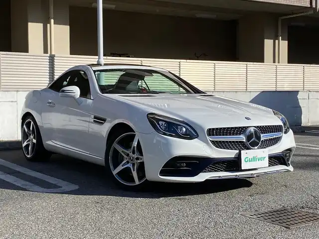 メルセデス・ベンツ ＳＬＣ１８０ スポーツ 大阪府 2017(平29)年 4.1万km ポーラホワイト 電動オープン/純正ナビ/フルセグテレビ/バックカメラ/ブラインドスポットモニター/コーナーセンサー/スポーツサスペンション/アイドリングストップ/追従式クルーズコントロール/ビルトインETC/両席メモリ付きパワーシート/DVD再生/アダプティブLEDヘッドライト/ウィンカーミラー/アナログ時計/9速ATミッション/禁煙車