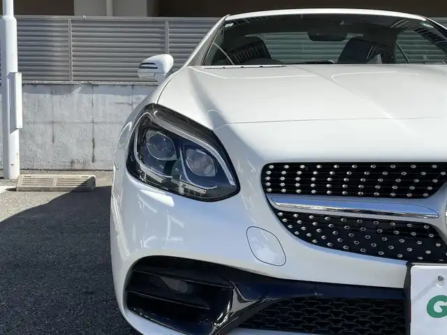 メルセデス・ベンツ ＳＬＣ１８０ スポーツ 大阪府 2017(平29)年 4.1万km ポーラホワイト 電動オープン/純正ナビ/フルセグテレビ/バックカメラ/ブラインドスポットモニター/スポーツサスペンション/アイドリングストップ/追従式クルーズコントロール/ビルトインETC/アダプティブLEDヘッドライト/ウィンカーミラー/アナログ時計/9速ATミッション