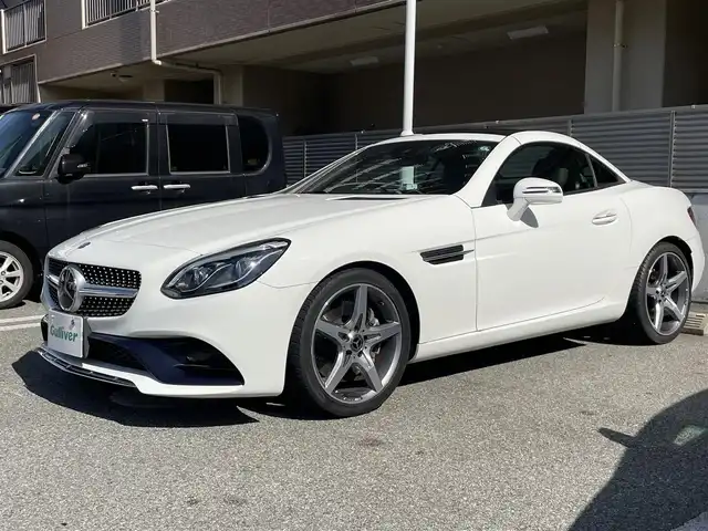 メルセデス・ベンツ ＳＬＣ１８０ スポーツ 大阪府 2017(平29)年 4.1万km ポーラホワイト 電動オープン/純正ナビ/フルセグテレビ/バックカメラ/ブラインドスポットモニター/スポーツサスペンション/アイドリングストップ/追従式クルーズコントロール/ビルトインETC/アダプティブLEDヘッドライト/ウィンカーミラー/アナログ時計/9速ATミッション