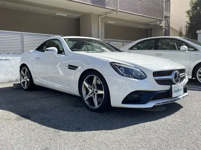 メルセデス・ベンツ ＳＬＣ１８０ スポーツ 大阪府 2017(平29)年 4.1万km ポーラホワイト 電動オープン/純正ナビ/フルセグテレビ/バックカメラ/ブラインドスポットモニター/スポーツサスペンション/アイドリングストップ/追従式クルーズコントロール/ビルトインETC/アダプティブLEDヘッドライト/ウィンカーミラー/アナログ時計/9速ATミッション