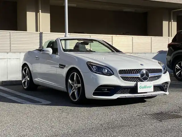 メルセデス・ベンツ ＳＬＣ１８０ スポーツ 大阪府 2017(平29)年 4.1万km ポーラホワイト 電動オープン/純正ナビ/フルセグテレビ/バックカメラ/ブラインドスポットモニター/コーナーセンサー/スポーツサスペンション/アイドリングストップ/追従式クルーズコントロール/ビルトインETC/両席メモリ付きパワーシート/DVD再生/アダプティブLEDヘッドライト/ウィンカーミラー/アナログ時計/9速ATミッション/禁煙車