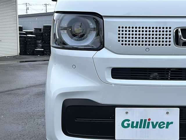 ホンダ Ｎ ＢＯＸ 道北・旭川 2024(令6)年 1万km プラチナホワイトパール /4WD//禁煙車//純正ナビ/BT/USB/TV//バックカメラ//ETC//片側パワースライドドア//ミラーヒーター//エコモード//ステアリングスイッチ//オートライト//LEDヘッドライト//LEDウィンカー//ミラーウィンカー//ロールサンシェード//ホンダセンシング//CMBS//ACC//LKAS//踏み間違え衝突軽減システム//急アクセル抑制機能//歩行者事故低減システム//路外逸脱抑制機能//先行車発信お知らせ//標識認識機能//オートハイビーム//パーキングセンサーシステム//保証書