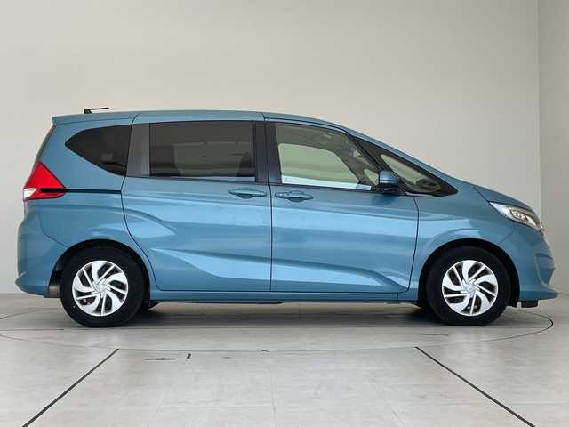 ホンダ フリード G ホンダセンシング 愛知県 2016(平28)年 6.5万km ブルーホライゾンM ホンダセンシング/純正9型ナビ　SDカードなし/フリップダウンモニター/クルーズコントロール/レーンキープアシスト/バックカメラ/衝突軽減システム/両側パワースライドドア/オートライト/LEDヘッドライト/ステアリングスイッチ/ステアリングスイッチ/スマートキー/プッシュスタート
