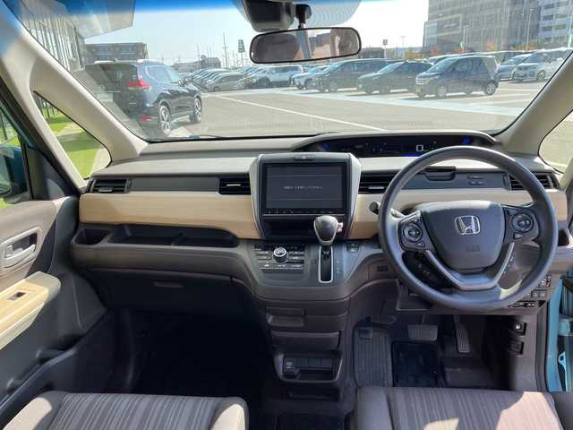 ホンダ フリード G ホンダセンシング 愛知県 2016(平28)年 6.5万km ブルーホライゾンM ホンダセンシング/純正9型ナビ　SDカードなし/フリップダウンモニター/クルーズコントロール/レーンキープアシスト/バックカメラ/衝突軽減システム/両側パワースライドドア/オートライト/LEDヘッドライト/ステアリングスイッチ/ステアリングスイッチ/スマートキー/プッシュスタート