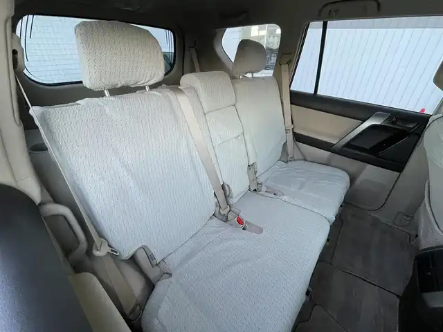 トヨタ ランドクルーザー プラド TX 東京都 2013(平25)年 2.5万km ホワイトパールクリスタルシャイン ナビ　/横滑り防止　/電格ミラー　/ビルトインＥＴＣ　/トランスファースイッチ　/ウィンドシールドデアイサー　/ヘッドライトレベライザー　/純正フロアマット　/ドアバイザー　/ステアリングスイッチ　/プッシュスタート