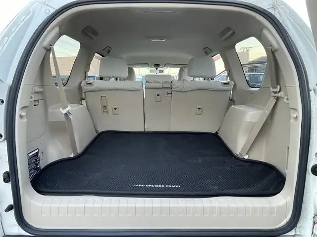 トヨタ ランドクルーザー プラド TX 東京都 2013(平25)年 2.5万km ホワイトパールクリスタルシャイン ナビ　/横滑り防止　/電格ミラー　/ビルトインＥＴＣ　/トランスファースイッチ　/ウィンドシールドデアイサー　/ヘッドライトレベライザー　/純正フロアマット　/ドアバイザー　/ステアリングスイッチ　/プッシュスタート