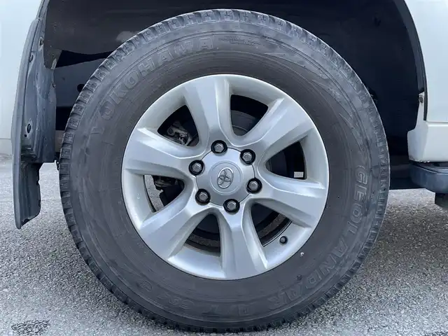 トヨタ ランドクルーザー プラド TX 東京都 2013(平25)年 2.5万km ホワイトパールクリスタルシャイン ナビ　/横滑り防止　/電格ミラー　/ビルトインＥＴＣ　/トランスファースイッチ　/ウィンドシールドデアイサー　/ヘッドライトレベライザー　/純正フロアマット　/ドアバイザー　/ステアリングスイッチ　/プッシュスタート