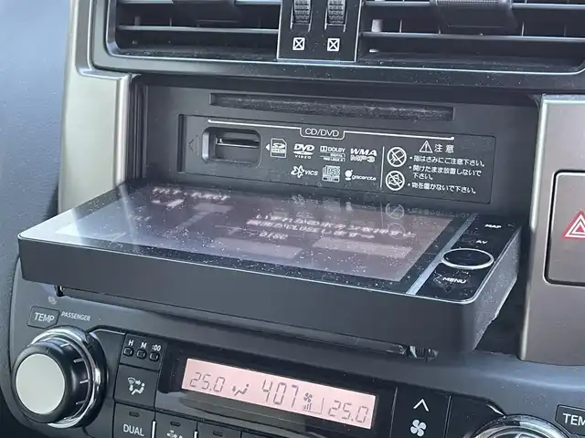 トヨタ ランドクルーザー プラド TX 東京都 2013(平25)年 2.5万km ホワイトパールクリスタルシャイン ナビ　/横滑り防止　/電格ミラー　/ビルトインＥＴＣ　/トランスファースイッチ　/ウィンドシールドデアイサー　/ヘッドライトレベライザー　/純正フロアマット　/ドアバイザー　/ステアリングスイッチ　/プッシュスタート