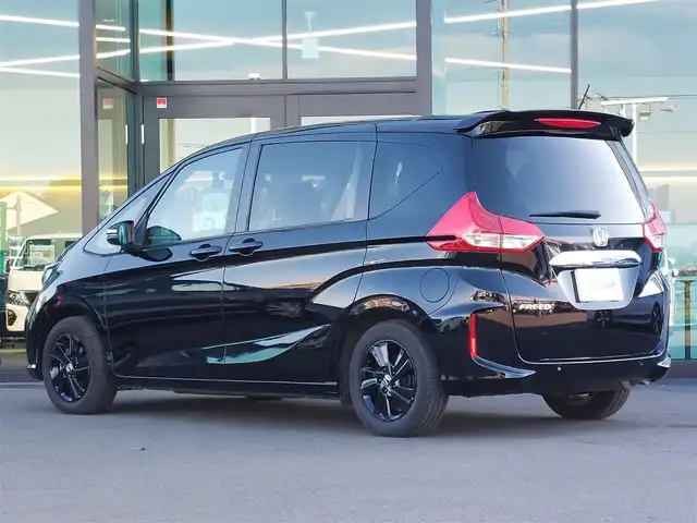 ホンダ フリード G ホンダセンシング 東京都 2021(令3)年 2万km クリスタルブラックパール Cパッケージ/・UVカットガラス/・前席シートヒーター/・2列目サンシェード/純正SDナビ/バックカメラ/CD/DVD/BT/AM/FM/TV/両側パワースライドドア/リアスポイラー/ビルトインETC/アイドリングストップ/前後ドライブレコーダー/ホンダセンシング/衝突軽減ブレーキ/レーントレーシングアシスト/アダプティブクルーズコントロール