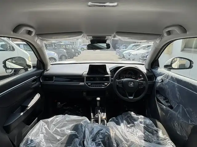 ホンダ ＷＲ－Ｖ X 三重県 2024(令6)年 0.1千km プラチナホワイトパール ♪♪登録済未使用車♪♪/ホンダセンシング/　・衝突軽減ブレーキ(CMBS)/　・踏み間違い衝突軽減システム/　・路外逸脱抑制機能/　・歩行者事故低減ステアリング/　・先行車発進お知らせ/　・標識認識機能/　・オートハイビーム/　・パーキングセンサーシステム/　・アダプティブクルーズコントロール/　・車線維持支援システム/スマートキーx2/プッシュスタート/パドルシフト/LEDヘッドライト/オートライト/ライトレベリング/横滑り防止/ターンミラー/電動格納ミラー/サイドカーテンエアバック