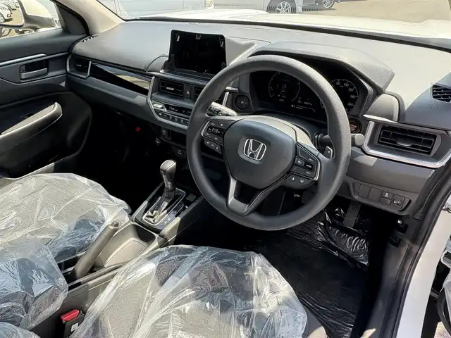 ホンダ ＷＲ－Ｖ X 三重県 2024(令6)年 0.1千km プラチナホワイトパール ♪♪登録済未使用車♪♪/ホンダセンシング/　・衝突軽減ブレーキ(CMBS)/　・踏み間違い衝突軽減システム/　・路外逸脱抑制機能/　・歩行者事故低減ステアリング/　・先行車発進お知らせ/　・標識認識機能/　・オートハイビーム/　・パーキングセンサーシステム/　・アダプティブクルーズコントロール/　・車線維持支援システム/スマートキーx2/プッシュスタート/パドルシフト/LEDヘッドライト/オートライト/ライトレベリング/横滑り防止/ターンミラー/電動格納ミラー/サイドカーテンエアバック