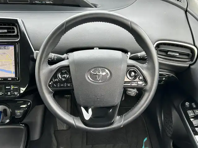 トヨタ プリウス A 岡山県 2019(令1)年 6.7万km ホワイトパールクリスタルシャイン 純正9インチナビ/Bluetooth　CD　DVD/フルセグ　TV/バックカメラ/モデリスタエアロ　（フロント、サイド、リア）/ETC/トヨタセーフティセンス/衝突軽減システム　/衝突軽減ブレーキ/車線逸脱抑制機能/車線逸脱警報/ふらつき警報/交差点危険警報/パーキングサポートブレーキ/リヤクロストラフィックアラート/クリアランスソナー/ブラインドスポットモニター/クルーズコントロール/オートライト/オートハイビームアシスト/ヘッドアップディスプレイ/革ステアリング/ステアリングスイッチ