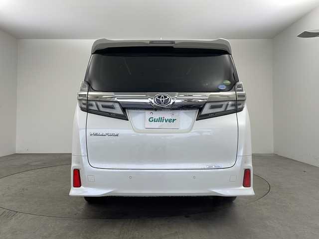 トヨタ ヴェルファイア Z Gエディション 兵庫県 2018(平30)年 5.8万km ホワイトパールクリスタルシャイン ・ワンオーナー車/・純正ナビ/CD/DVD/BT/AUX/TV/USB/HDMI/・純正フリップダウンモニター/・バックカメラ/・JBLプレミアムサウンドシステム/・シートヒーター（運転席＋助手席）/・エアシート（運転席＋助手席）/・パワーシート（１列目＋２列目）/・メモリーシート（運転席）/・黒革シート/・オットマン/・パワーバックドア/・ステアリングヒーター/・トヨタセーフティセンス/・プリクラッシュセーフティ/・レーンディパーチャーアラート/・ブラインドスポットモニター/・レーダークルーズコントロール/・電動パーキングブレーキ/・LEDオートライト/・オートマチックハイビーム/・両側パワースライドドア/・パーキングアシスト/・デジタルインナーミラー/・社外ドライブレコーダー/・ビルトインETC2.0/・スマートキー/・スペアキー/・nanoe/・純正ウッドコンビステアリング/・純正AW/・純正フロアマット