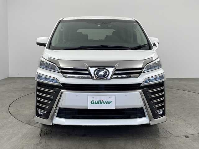 トヨタ ヴェルファイア Z Gエディション 兵庫県 2018(平30)年 5.8万km ホワイトパールクリスタルシャイン ・ワンオーナー車/・純正ナビ/CD/DVD/BT/AUX/TV/USB/HDMI/・純正フリップダウンモニター/・バックカメラ/・JBLプレミアムサウンドシステム/・シートヒーター（運転席＋助手席）/・エアシート（運転席＋助手席）/・パワーシート（１列目＋２列目）/・メモリーシート（運転席）/・黒革シート/・オットマン/・パワーバックドア/・ステアリングヒーター/・トヨタセーフティセンス/・プリクラッシュセーフティ/・レーンディパーチャーアラート/・ブラインドスポットモニター/・レーダークルーズコントロール/・電動パーキングブレーキ/・LEDオートライト/・オートマチックハイビーム/・両側パワースライドドア/・パーキングアシスト/・デジタルインナーミラー/・社外ドライブレコーダー/・ビルトインETC2.0/・スマートキー/・スペアキー/・nanoe/・純正ウッドコンビステアリング/・純正AW/・純正フロアマット