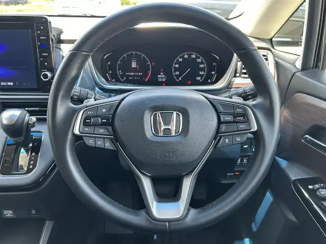 ホンダ オデッセイ アブソルート EX 福島県 2020(令2)年 0.9万km プレミアムヴィーナスブラックP Honda SENSING/・衝突軽減ブレーキ/・オートハイビーム/・誤発進抑制機能/・後方誤発進抑制機能/・路外逸脱警報機能/・車線維持支援システム/・歩行者事故低減ステアリング/・先行車発進お知らせ機能/・標識認識機能/純正10inメモリナビ/　【フルセグ/CD/DVD/SD/MSV/BT/USB/HDMI】/バックカメラ/全周囲カメラ/フリップダウンモニター/両側パワースライドドア/ハーフレザーシート/前席パワーシート/前席シートヒーター/ビルトインETC2.0/ドライブレコーダー前後/ステアリングスイッチ/レーダークルーズコントロール/パドルシフト/パーキングアシスト/レーンキープアシスト/横滑り防止機能/衝突軽減システム/アイドリングストップ/LEDヘッドライト（AUTO機能付き）/　・フォグランプ/純正フロアマット/純正ドアバイザー
